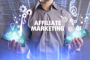 Business, Technology, Internet and network concept. Young businessman working on a virtual screen of the future and sees the inscription: Affiliate marketing