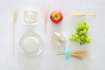 dairy products and fruits. Symbols of jewish holiday - Shavuot