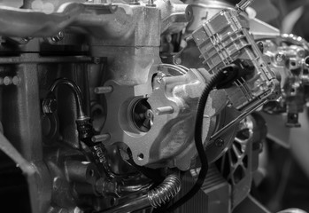 Fototapeta premium The car engine, engine compartment, Car Engine background, A fragment of the engine,