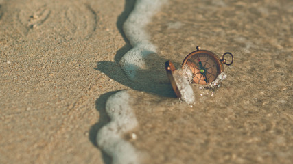 Compass On Beach