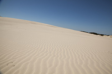 Sand, dunes and blue sky