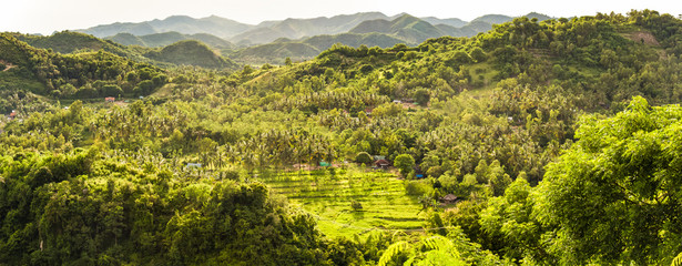 Panoramic view of the green hills and mountain village