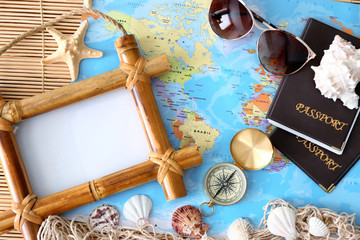 Travel concept. Composition with photo frame, closeup