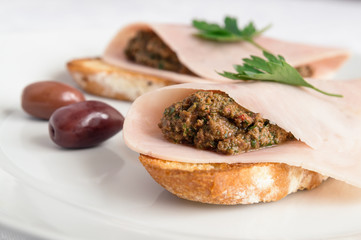 toasts with ham and olive pate