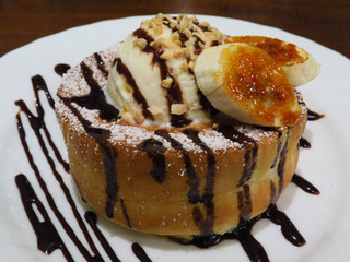 Super delicious carameled banana pancake souffle with chocolate sauce