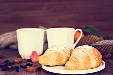 Two cups of tea in a romantic setting.