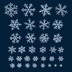 Set of different hand-drawn snowflakes