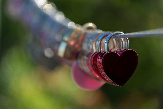 Red Lock In Hart Shape On Rope Bridge