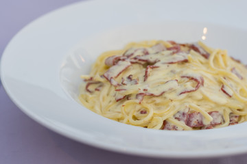 spaghetti carbonara on the white plate