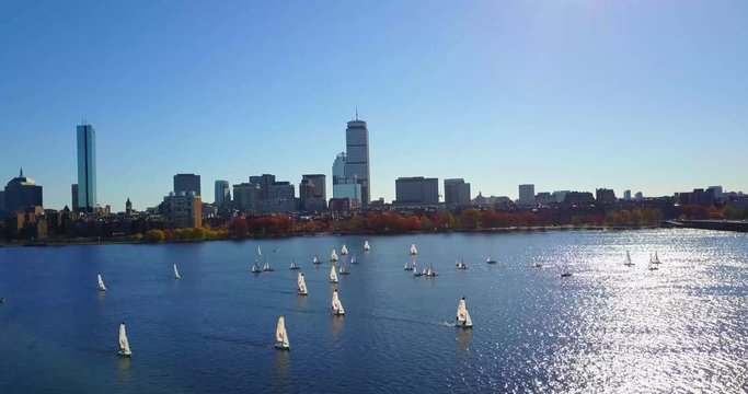 Drone footage of sailing regatta on the Charles River with the Boston Skyline in the background