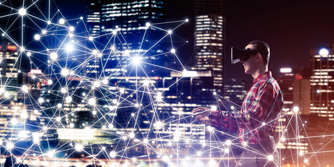 Guy wearing checked shirt and virtual mask reaching hand to feel