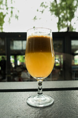 Summer refreshment - fresh juice mix made of carrot, apple, orange, kiwi and lemon