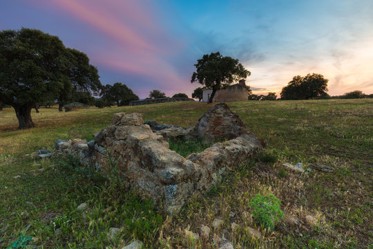 Landscape with ruins at sunset