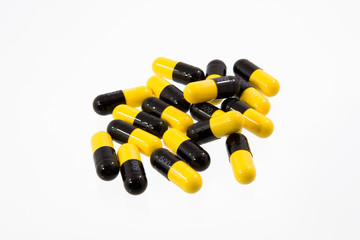 Yellow and black pills