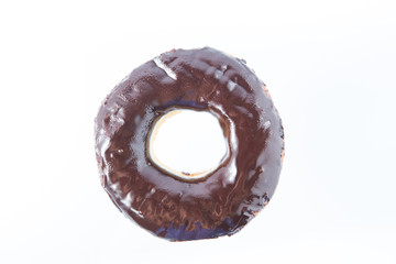 Glossy chocolate donut isolated on white background
