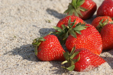 Strawberries in the sand, beach, sea, summer