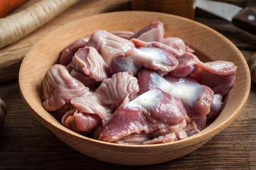 Raw uncooked chicken gizzards.