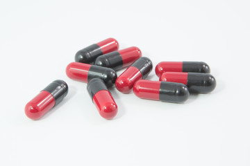 Black and red medicine tablet antibiotic pills 