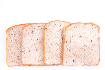 whole wheat bread  cut into pieces, isolated on white background