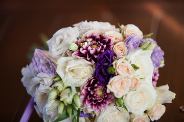 Wedding rings on the bride's bouquet