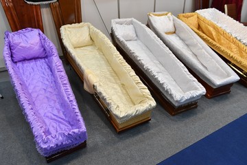 Luxury coffins at a funeral exhibition
