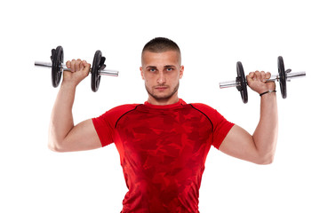 Fototapeta na wymiar Young man doing shoulder workout