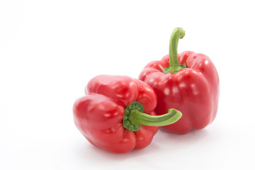 Red capsicum or sweet pepper isolated on white background