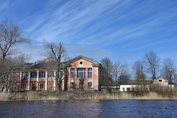 An old brick building near river