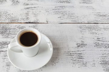 Coffee espresso on white wooden table