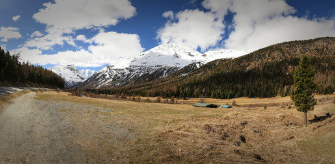 alps with water and mountains