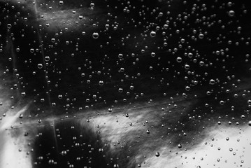water drops on foil background