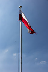 Polish national flag at the summit of liberation mound