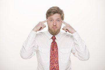 Young business man is puzzled