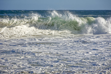 Wave crashing at Ipanema beach in Rio de Janeiro