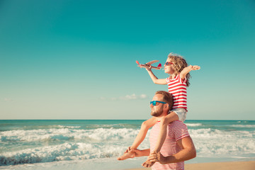 Happy family having fun on summer vacation