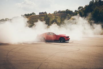 Fototapeta na wymiar Blured car drifting, motion blur drift