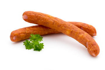 Stack of smoked sausages isolated on a white background.