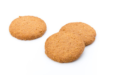 Stacked short pastry cookies isolated on white background.