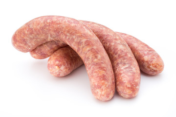 Raw sausage with parsley leaf isolated on white background.