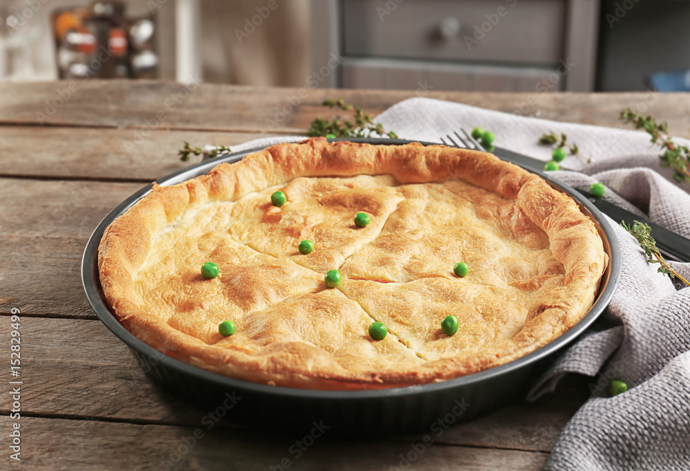 Canvas Prints Baked chicken pot pie on wooden table