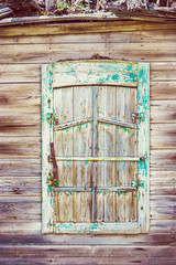 Weathered Wooden Window of old Russian  Slum House in Astrakhan