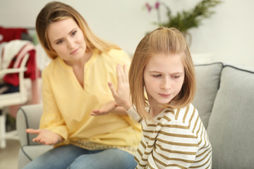 Obraz na płótnie Canvas Quarrel between mother and daughter at home