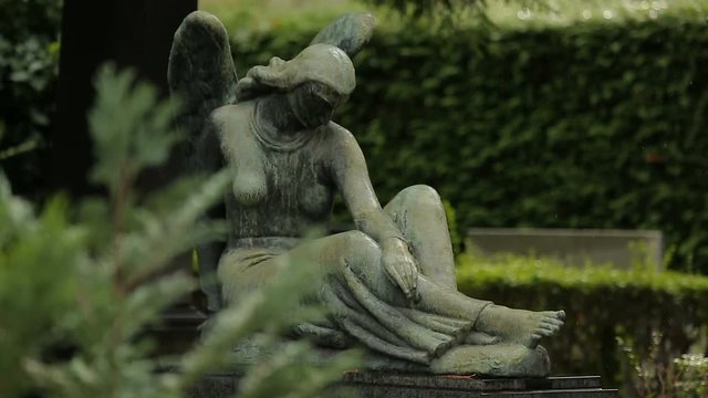 View on beautiful sculpture of sad female angel, statue at Mirogoj cemetery