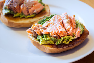 Salmon and Guacamole on a Toasted Bagel