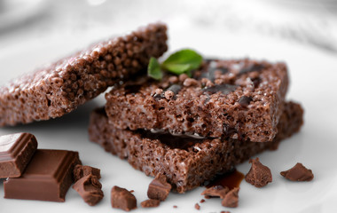 Chocolate crispy dessert on white plate