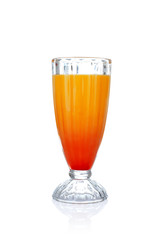 Glass of Tequila Sunrise cocktail on white background