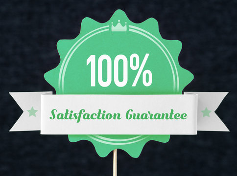 100% satisfaction guarantee badge cut from cardboard and paper on a wooden stick. Green banner, seal and ribbon for business website to promise customer the best premium quality product or service.