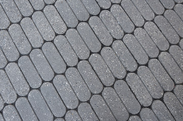 Dark grey granite mosaic pavement background