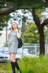 outdoor portrait of young gorgeous lady, woman in city, urban casual lifestyle shot