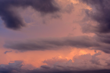 Naklejka na ściany i meble Abstract background of evening sky with rain clouds.
